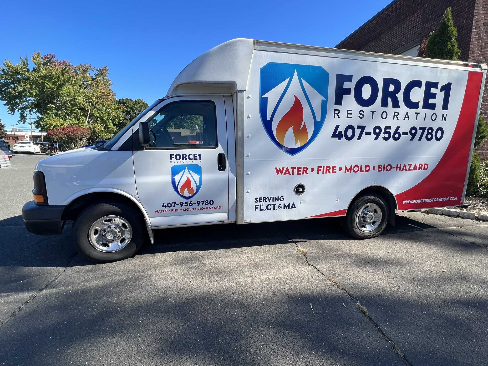 Restoration service truck, water and fire damage specialists.